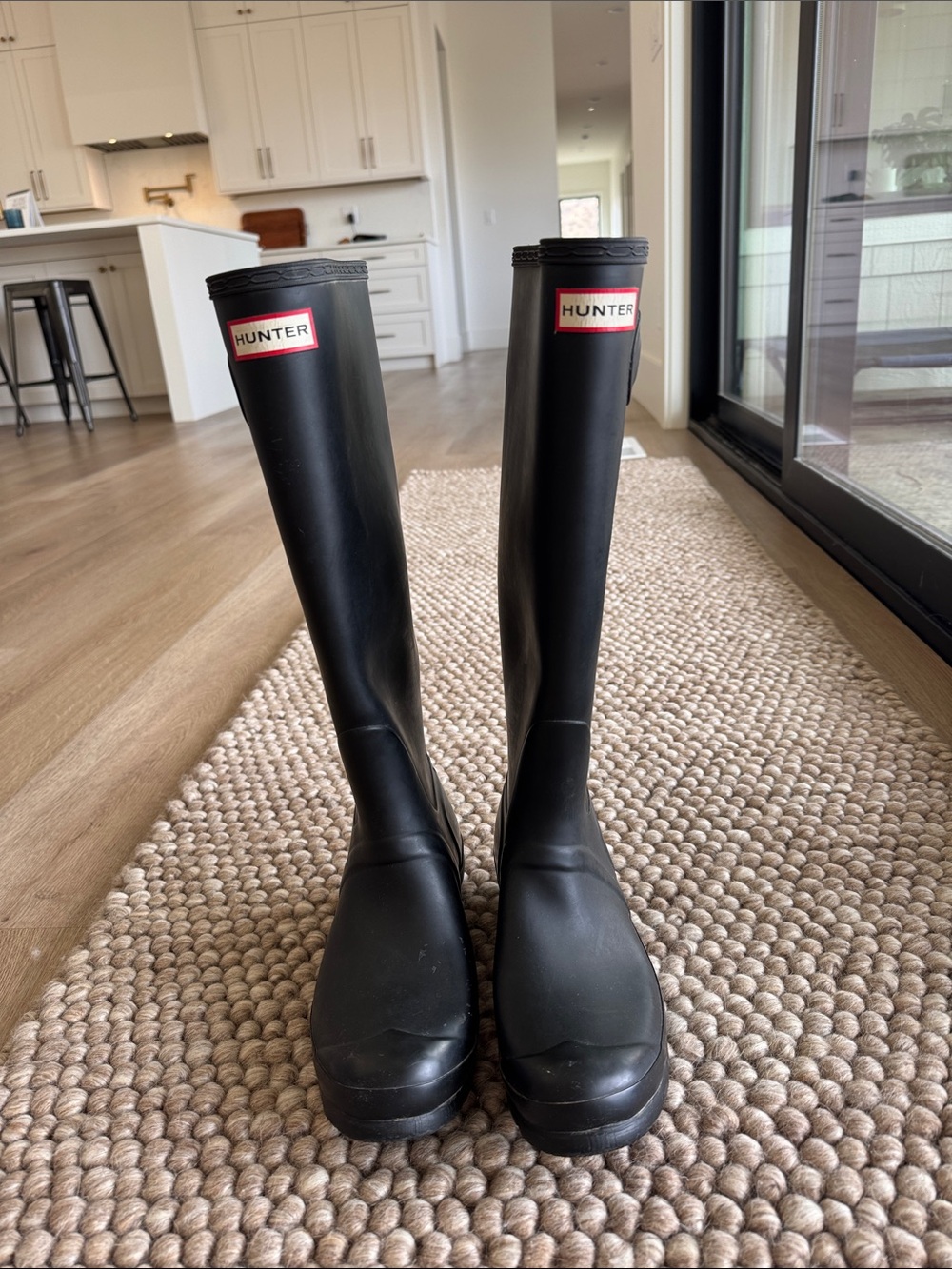Hunter Black Knee-High Rain Boots with Red Logo